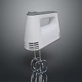 Sleek White Hand Mixer Kitchen Appliance With Stainless Steel Mixing Beaters