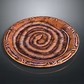 Wooden Desk With Decorative Copper Spiral Pattern Plate On Surface