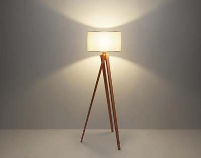 Modern Wooden Tripod Floor Lamp with White Lampshade in Gray Wall and Soft Lighting Effect 3d model