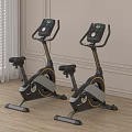 Indoor Stationary Exercise Bikes on Wooden Floor with Light Colored Walls