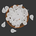 Fresh Green Pears in Wooden Plate with Some Scattered Around Black Background