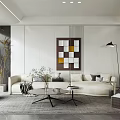 Modern Living Room With Cream Sofa Glass Coffee Table Floor Lamp And Geometric Wall Art
