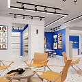 Blue Themed Studio Interior Design With Framed Portraits Lighted Mirror White Cabinets And Orange Accents