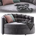 Cozy Round Gray Velvet Accent Chair With Soft Cushions Colorful Pillows And Throw Blanket
