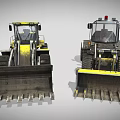 Two Yellow Construction Loaders With Large Buckets And Heavy Duty Tires