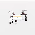 Two Vintage Metal Deer Sculptures With Antlers In Standing Pose