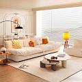 Modern Living and Dining Room with White Sofa Pillows Round Coffee Table and Dining Table