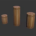 Bamboo Furniture Three Cylindrical Decorative Pieces With Intricate Carved Tops And Natural Finish