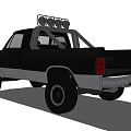 Black Pickup Truck With Three Yellow Roof Lights Front Bumper Guard And Off Road Tires