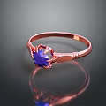 Fashionable Rose Gold Ring With Blue Gemstone And Elegant Delicate Setting