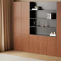 Modern Wooden Bookcase With Brown And Black Shelves And Cabinet Doors Near Window With Natural Light
