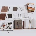 Various Notebooks And Stationery Collection With Open Pages Pens And Stacked Binders