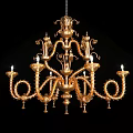 Golden Ornate Chandelier With Decorative Details And Candelabra Style Arms
