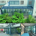 Gym Building with Glass Structure and Indoor Workout Equipment Surrounded by Green Trees