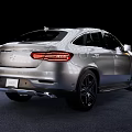 Sleek Silver SUV Coupe With Modern Aerodynamic Design Black Alloy Wheels And Streamlined Body
