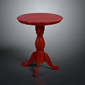 Red Round Wooden Table With Carved Pedestal Base And Three Legs