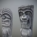 Traditional Wooden Totem Poles With Intricate Facial Carvings And Body Details