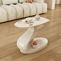 Elegant Modern Sofa And Coffee Table Set With Curved Design Light Curtains And Natural Light