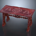 Chinese Style Red Wood Table With Intricate Carved Patterns And Decorative Legs