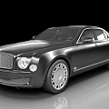 Luxury Black Sedan With Shiny Finish Front Grille And Silver Wheels