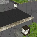 Outdoor Lantern Style Lights Illuminating Wet Stone Pavement In Evening Garden With Natural Surroundings