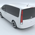 White Modern Van With Sleek Exterior Design Black Windows And Alloy Wheels