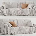 Light Linen Covered Sectional Sofa Featuring White And Brown Accent Pillows 3d model