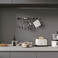 Modern Gray Kitchen Countertop With Toaster Food Processor And Hanging Utensil Rack