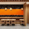Casual Dining Restaurant With Orange Signage Pendant Lights Wooden Counter And Seating Area
