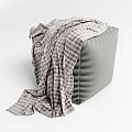 Gray Upholstered Sofa Stool With Soft Plaid Blanket For Cozy Living Space