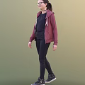 A woman wearing maroon hoodie black T-shirt black leggings and black shoes on green background