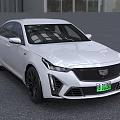 White Cadillac Luxury Sedan With Modern Exterior Design And Stylish Features