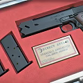 Direct Action Pistol Stored in Red Case with Magazines and Certification Plate
