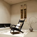 Japanese Style Black Lounge Chair In Serene Room With Calligraphy Scrolls And Vase