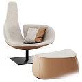Stylish Light Beige Upholstered Accent Chair With Gray Brown Pillows And Matching Ottoman