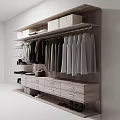 Organized Walk in Closet Interior With Hanging Clothes Shelves Drawers And Shoes