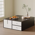 Black Coffee Table with White Drawers Cabinets Oranges Green Plant and Tray