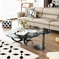 Modern Glass Coffee Table With Books Vase Plant And Sofa In Living Room