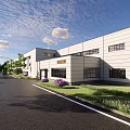Modern Industrial Factory Exterior With White Facade Large Windows And Greenery