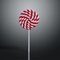 Red and White Swirl Lollipop on White Stick Against Dark Background