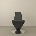 Modern Black Accent Chair with Unique Sloped Design and Silver Metal Base