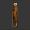 Elderly Man In Brown Robe Holding Walking Stick Standing Against Gray Background