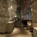 Cave Style Cafe Interior With Stone Walls Illuminated Lighting And Wooden Menu Boards