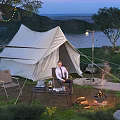 Cozy Campsite with White Canvas Tent Campfire String Lights Lake and Grass Area