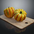 Two Vibrant Striped Pumpkins On Wooden Cutting Board For Food Preparation