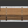 Stacked Wood Logs Tied With Rope Placed On White Stone Slab