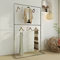 Iron Clothes Rack With Minimalist Design Hanging Clothes Scarves And Clips On White Background