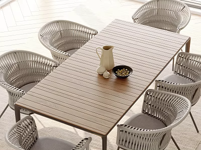 Wooden Outdoor Table With Rattan Chairs Water Jug And Nut Bowl On Patio 3d model
