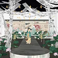 Floral Installation With Lotus Flowers Green Leaves And Traditional Figure In Chinese Garden