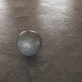 Various Colored Background Wall Design With Textured Surfaces And Decorative Spheres